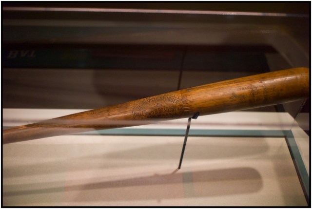 This is the actual bat used by Babe Ruth in the 1927 season. He put notches into the bat (around the logo) for each dinger.. This bat has only 22 notches until the bat broke and was saved for a museum piece.