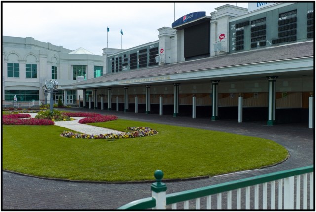 Paddock for the horses just before their races. The three stalls on the end are called the "schooling stalls" for horses new to Churchill Downs and the crowds it draws. They don't race, but are able to acclimate themselves for future races.