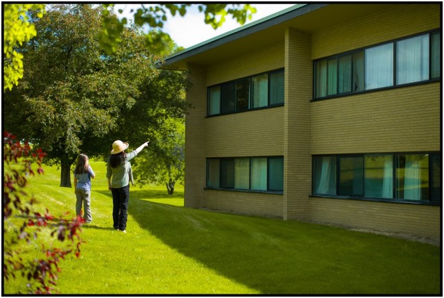 Me, pointing out my old dorm room window to the kids.