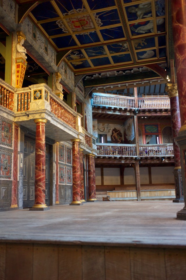The boxes with scenes painted in them were the good seats. 