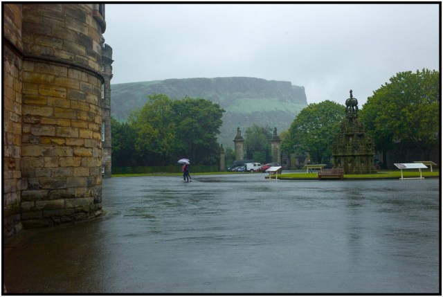 View of Edinburgh with "Arthur's Seat" (hilltop) in the background.